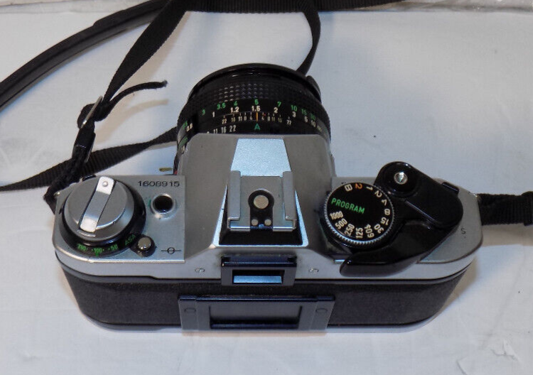 Canon AE-1 Program SLR 35mm Film Camera With 50mm 1:1.8 FD Lens With Case