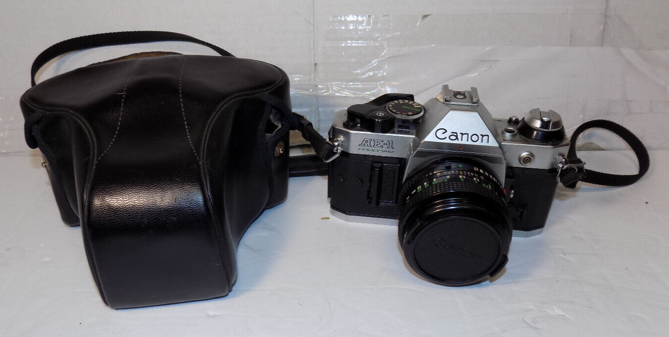 Canon AE-1 Program SLR 35mm Film Camera With 50mm 1:1.8 FD Lens With Case