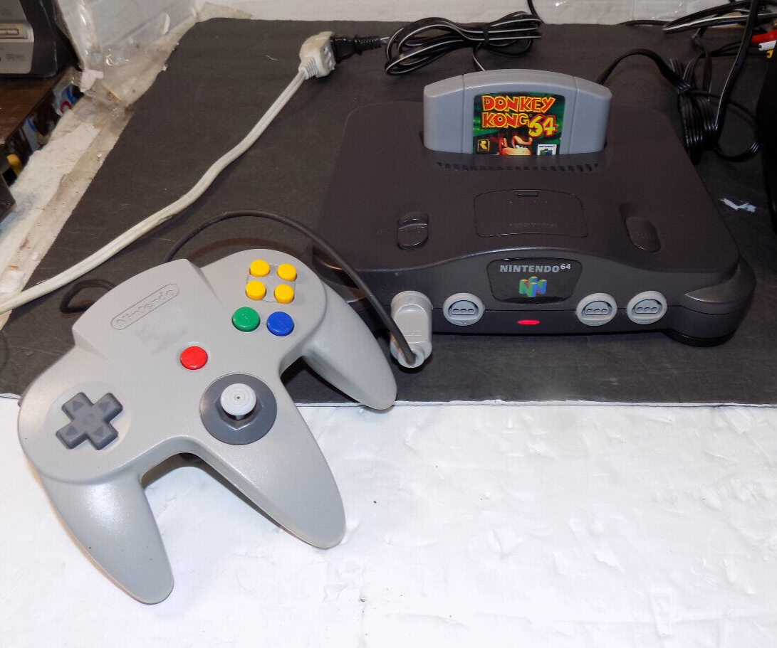 Nintendo 64 game console lot with store controllers