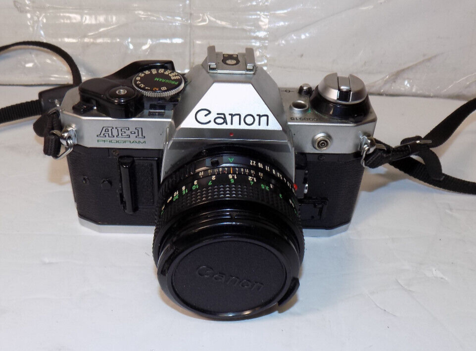 Canon AE-1 Program SLR 35mm Film Camera With 50mm 1:1.8 FD Lens With Case