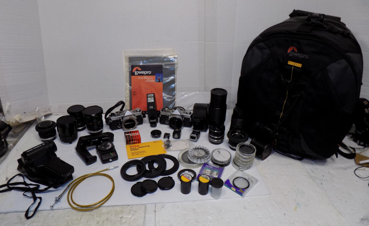 2 Olympus OM 1 35mm SLR Film Cameras with Lenses Filters Backpack and More