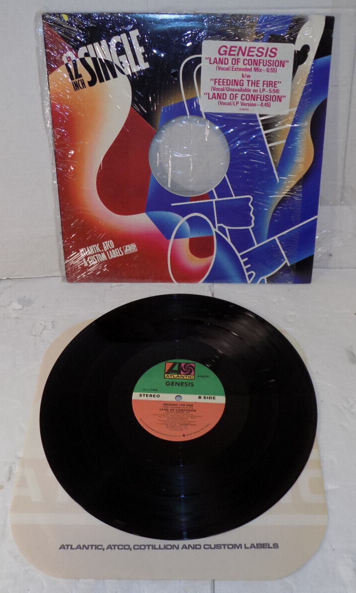Genesis Land of Confusion /Feeding the Fire Vinyl LP 1986 Atlantic Hype Sticker