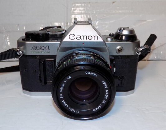 Canon AE-1 Program SLR 35mm Film Camera With 50mm 1:1.8 FD Lens With Case